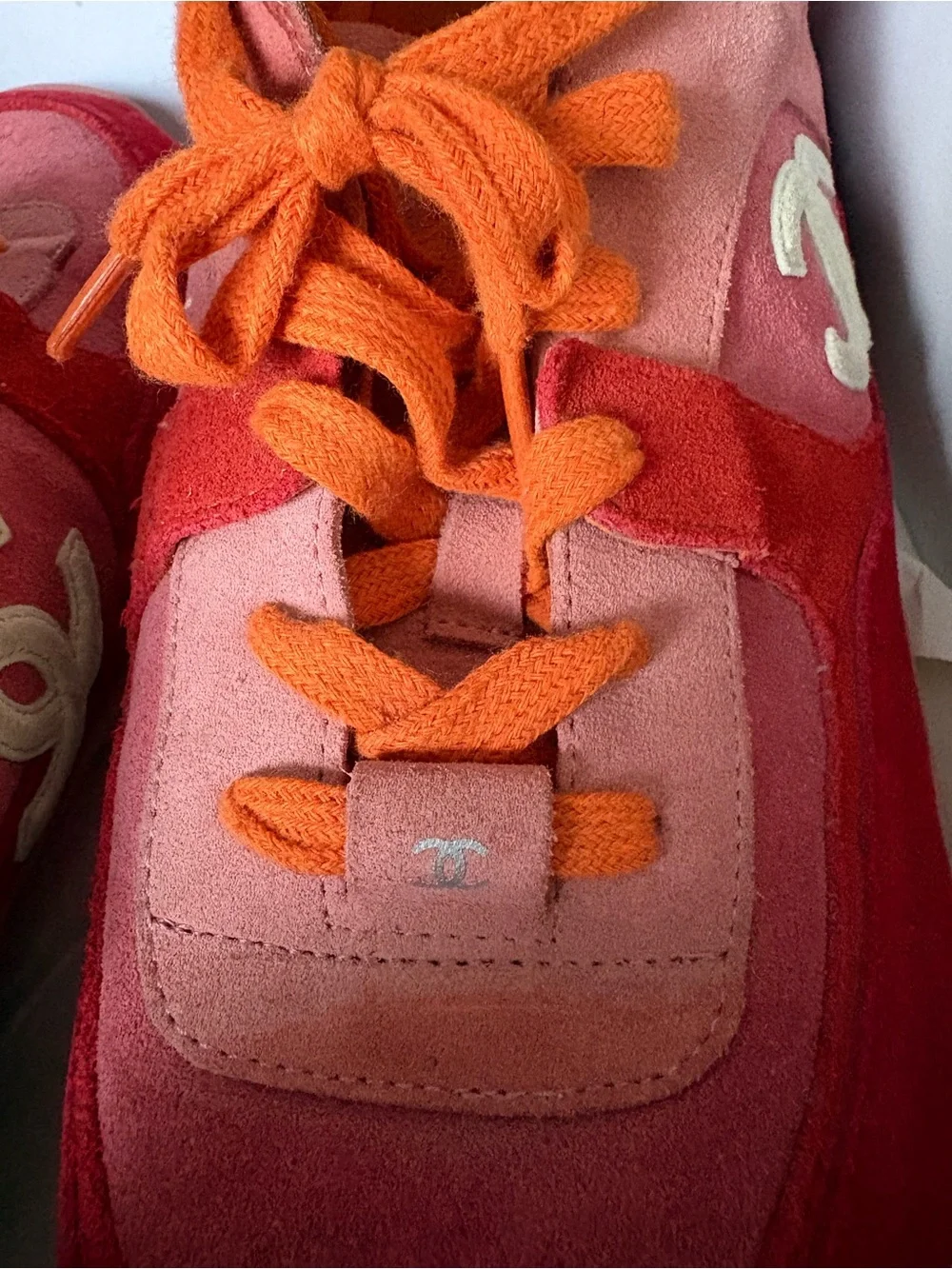 CHANEL Pink and Rose Suede Low-Top Sneakers